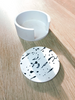 Black and white jesmonite round coasters